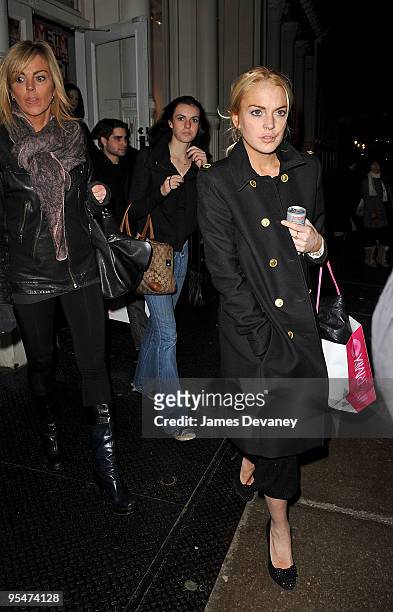 Dina Lohan, Ali Lohan and Lindsay Lohan seen leaving Intermix in SoHo on December 28, 2009 in New York City.