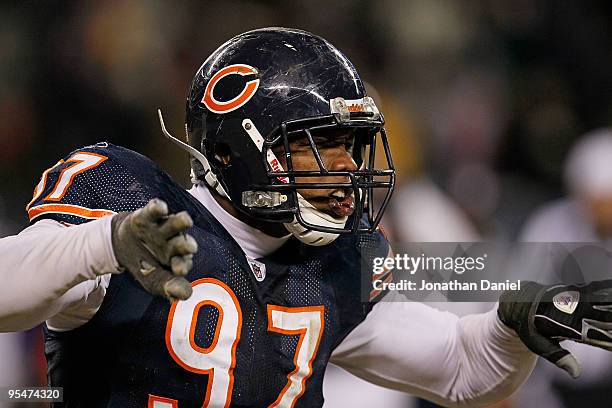 Mark Anderson of the Chicago Bears celebrates a sack of Brett Favre of the Minnesota Vikings in overtime at Soldier Field on December 28, 2009 in...