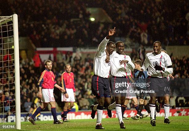 Emile Heskey celebrates his goal with England team mates Andy Cole and Ugo Ehiogu during the International Friendly against Spain played at Villa...