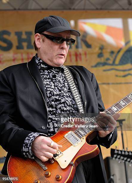 Rick Nielsen of Cheap Trick performs at the tailgate stage at the Miami Dolphins game at Landshark Stadium on December 27, 2009 in Miami, Florida.