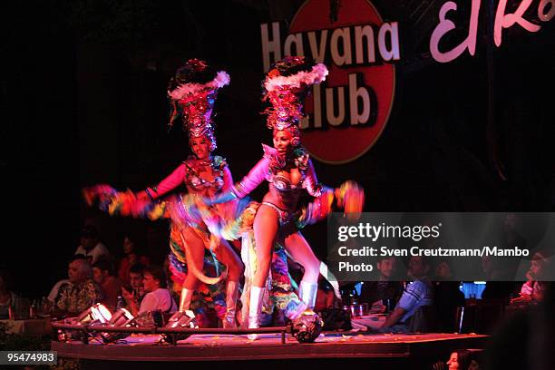 Dancers perform during a show to celebrate the 70th anniversary of the foundation of the Cuban Tropicana cabaret, on December 28 in Havana, Cuba....