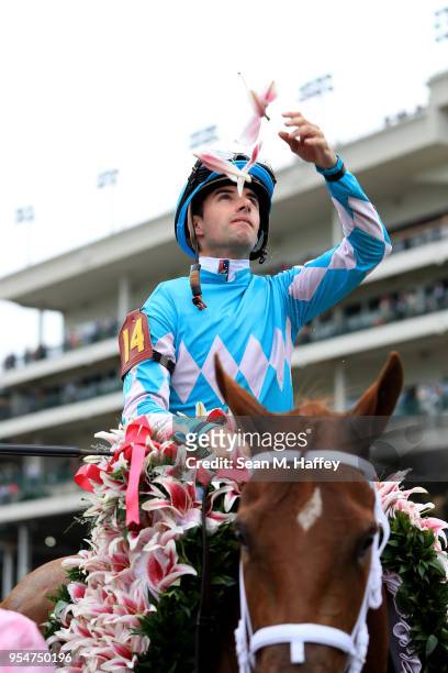 Joekey Florent Geroux celebrates atop of Monomoy Girl after winning the 144th running of the Kentucky Oaks at Churchill Downs on May 4, 2018 in...