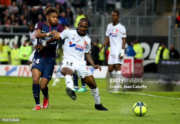 Christopher Nkunku of PSG, Gael Kakuta of Amiens during the Ligue 1 match between Amiens SC and Paris Saint Germain at Stade de la Licorne on May 4,...