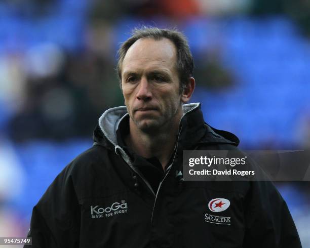 Brendan Venter, the Saracens head coach looks on during the Guinness Premiership match between London Irish and Saracens at the Madejski Stadium on...