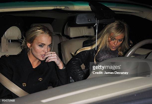 Lindsay Lohan and Dina Lohan seen leaving Intermix in SoHo on December 28, 2009 in New York City.