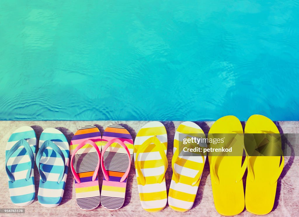 Flip flops on stone background