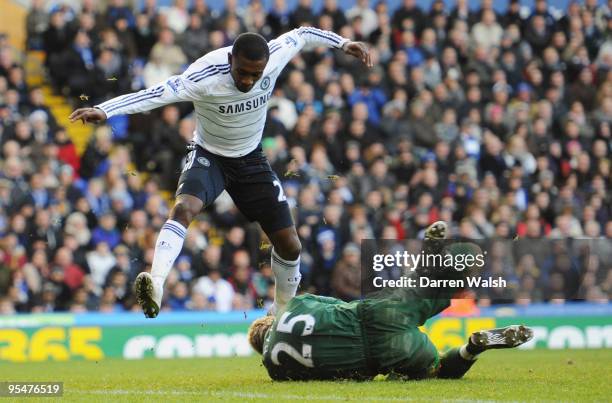 Salomon Kalou of Chelsea collides with goalkeeper Joe Hart of Birmingham City during the Barclays Premier League match between Birmingham City and...