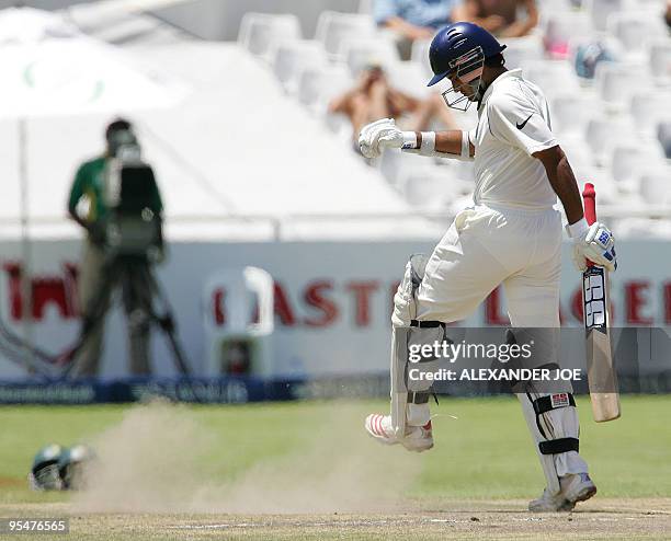 India's batsman Sourav Ganguly reacts after missing a shot off the South African bowler Jacques Kallis 05 January 2007 in Cape Town on the 4th Day of...