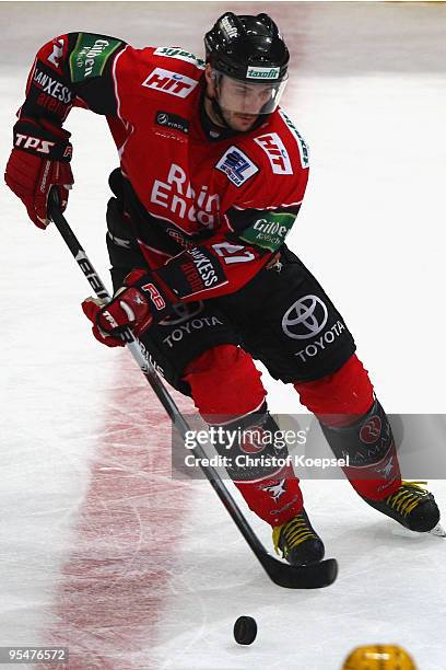 Ivan Ciernik of Koelner Haie leads the puck during the DEL match between Koelner Haie and Frankfurt Lions at the Lanxess Arena on December 27, 2009...