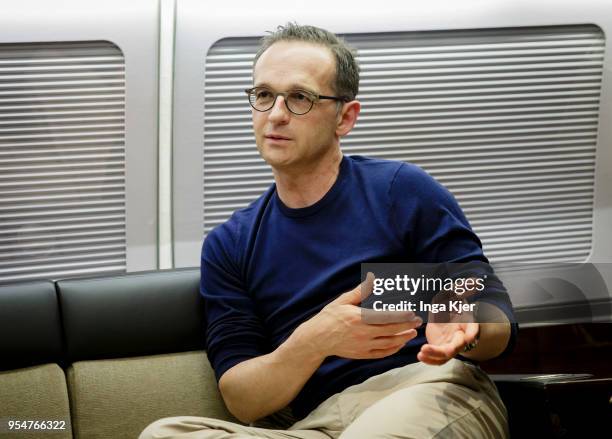 German Foreign Minister Heiko Maas talks to journalists during the flight back to Berlin, on May 04, 2018 in Arusha, Tanzania. Maas is on a three day...