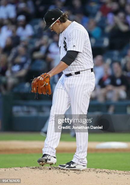 Starting pitcher Carson Fulmer of the Chicago White Sox reacts after giving up a solo home run to Eduardo Escobar of the Minnesota Twins in the 2nd...