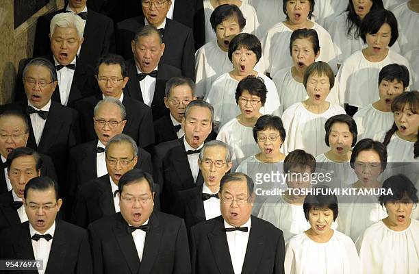 Members of a 223-member chorus group and four soloists perform Ludwig Van Beethoven's Symphony No.9 "Choral" during the 25th annual year-end concert...