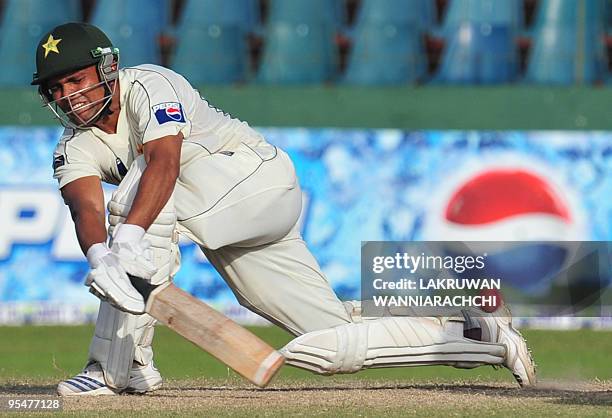 Pakistani cricketer Kamran Akmal bats during the third and final Test match between Sri Lanka and Pakistan at The Sinhalese Sports Club grounds in...