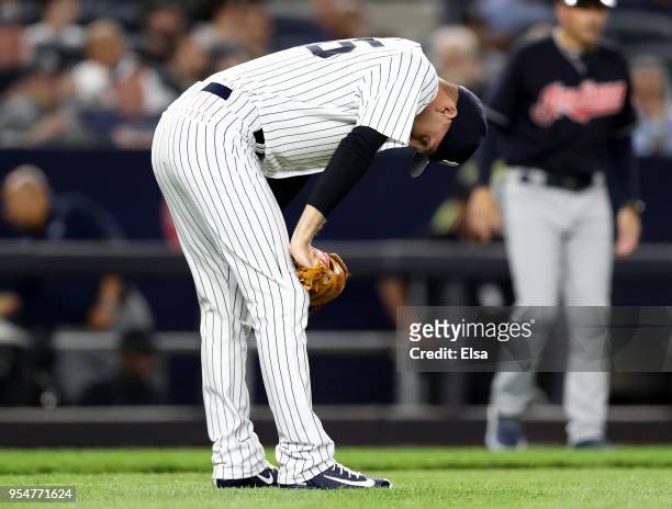 Chasen Shreve of the New York Yankees reacts after he gives up a three run home run to Bradley Zimmer in the eighth inning at Yankee Stadium on May...