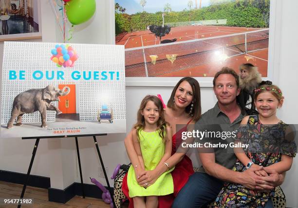 Erin Ludwig and Ian Ziering with Mia and Penna Ziering attend Gray Malin and Elizabeth Chambers celebrate Gray Malin's First Children's Book, "Be Our...