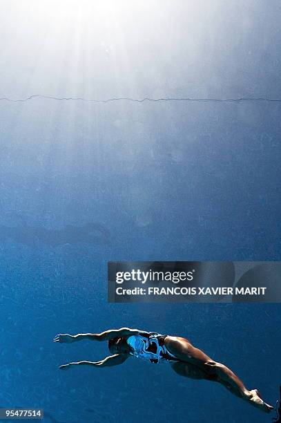 This underwater image shows France's Chloe Willhelm competing during the synchronised solo free final on July 23, 2009 at the FINA World Swimming...