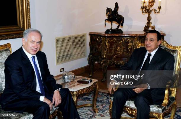 In this handout photo provided by the Israeli Government Press Ofiice , Israeli Prime Minister Benjamin Netanyahu meets Egyptian President Hosni...