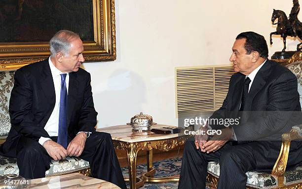 In this handout photo provided by the Israeli Government Press Ofiice , Israeli Prime Minister Benjamin Netanyahu meets Egyptian President Hosni...