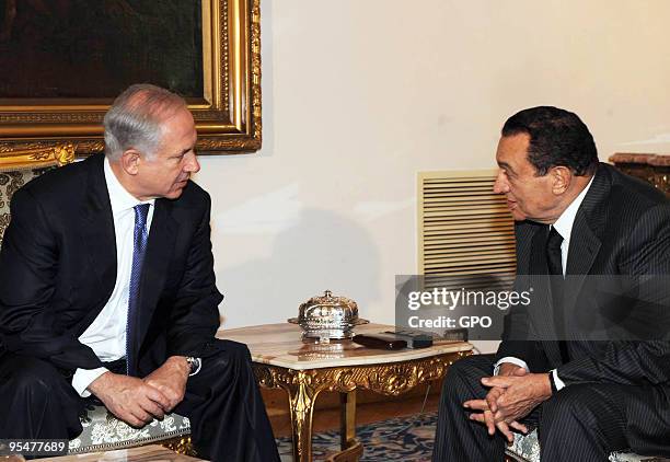In this handout photo provided by the Israeli Government Press Ofiice , Israeli Prime Minister Benjamin Netanyahu meets Egyptian President Hosni...