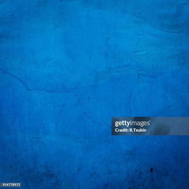 blue cracked wall background close up texture - cracked plaster stock pictures, royalty-free photos & images