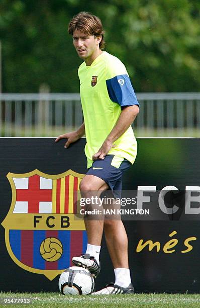 Barcelona's Brazilian player Maxwell watches a team training session at Bisham Abbey Sports Centre in Marlow, in southern England, on July 23, 2009....
