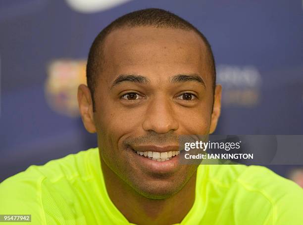 Barcelona's French player Thierry Henry answers questions during a press conference following a training session at Bisham Abbey Sports Centre in...