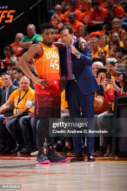 Head Coach Quin Snyder of the Utah Jazz speaks to Donovan Mitchell of the Utah Jazz during the game against the Houston Rockets during Game Three of...