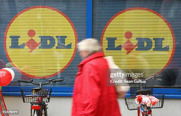 Man walks past a branch of German discount supermarket chain Lidl on December 29, 2009 in Berlin, Germany. Germany's biggest supermarket discounters,...