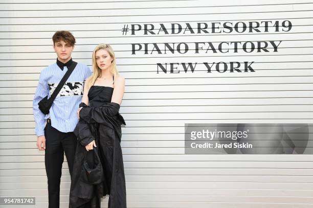 Model Anwar Hadid and Actor Nicola Peltz attend the Prada Resort 2019 fashion show on May 4, 2018 in New York City.