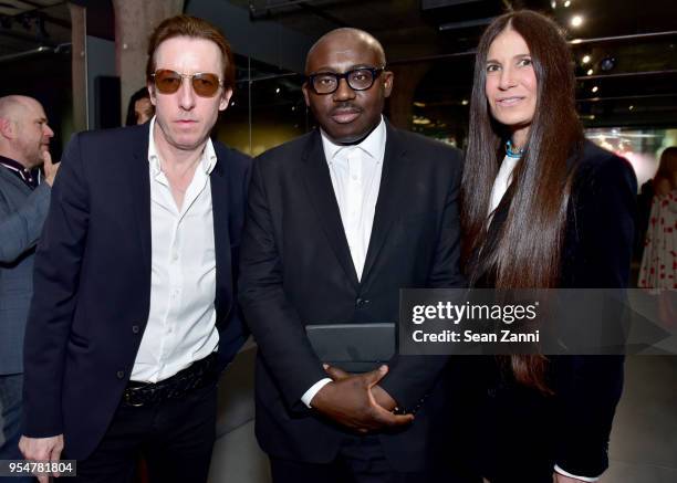 Craig McDean, Edward Enninful, and Elizabeth Saltzman attend the Prada Resort 2019 fashion show on May 4, 2018 in New York City.