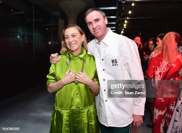 Designer Miuccia Prada and Designer Raf Simons attend the Prada Resort 2019 fashion show on May 4, 2018 in New York City.