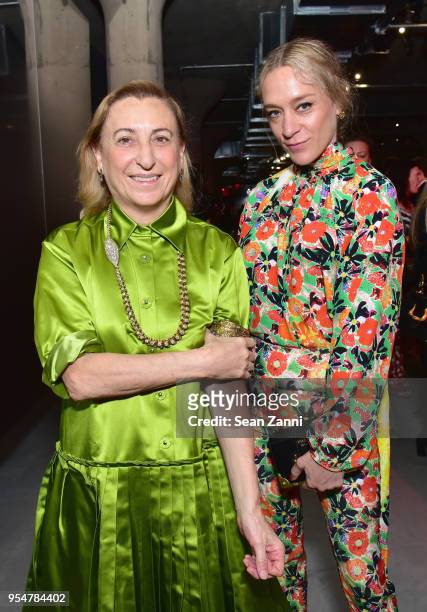 Designer Miuccia Prada and Actor Chloe Sevigny attend the Prada Resort 2019 fashion show on May 4, 2018 in New York City.