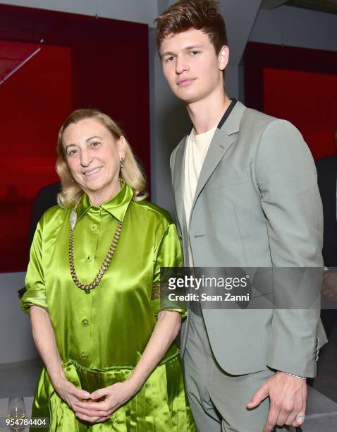 Designer Miuccia Prada and Actor Ansel Elgort attend the Prada Resort 2019 fashion show on May 4, 2018 in New York City.