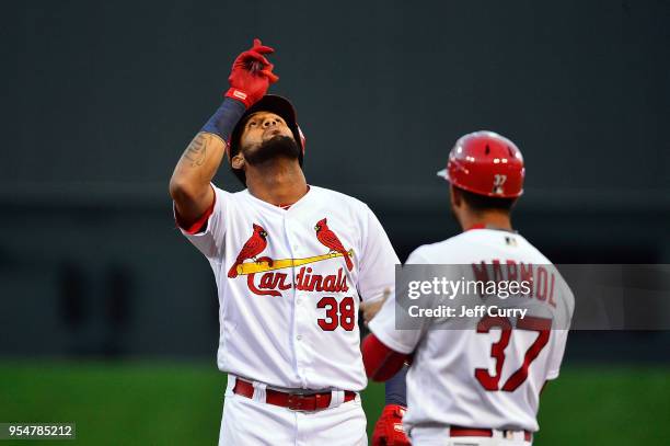 Jose Martinez of the St. Louis Cardinals celebrates after hitting a single during the first inning against the Chicago Cubs at Busch Stadium on May...