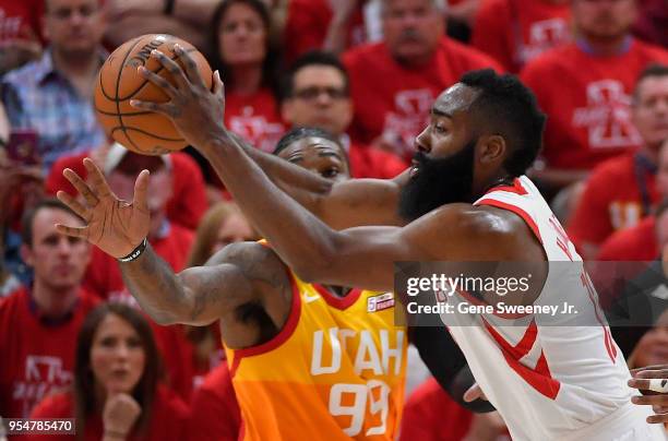 James Harden of the Houston Rockets looks to pass the ball in front of Jae Crowder of the Utah Jazz in the first half during Game Three of Round Two...