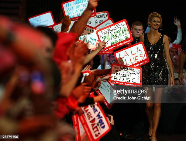 Fans waves placards before the match between Andy Hamilton of England and Steve Beaton of England, during the 2010 Ladbrokes.com World Darts...