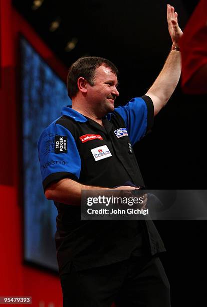 Terry Jenkins of England wins his match against Darin Young of USA during the 2010 Ladbrokes.com World Darts Championships at Alexandra Palace on...