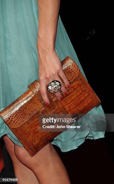 The handbag carried by Olivia Palermo as she attends the Dolce and Gabbana Party at Le Baoly, Port Canto during the 62nd Annual Cannes Film Festival...