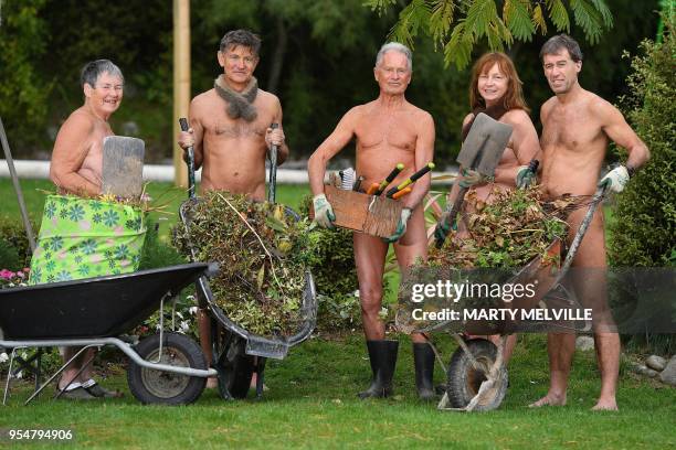 June Campbell-Teng, Philip Beach, Jeff Hatfield, Robyn Beach and Brent Anderson pose for a group photo as they celebrate World Naked Gardening Day at...