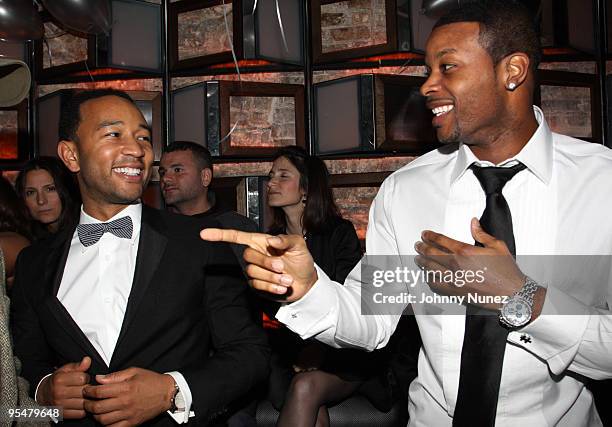 John Legend and Kerry Rhodes attend Legend's birthday party at SL on December 28, 2009 in New York City.