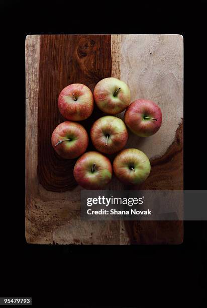 gala apples on a cutting board - circle gala stock pictures, royalty-free photos & images