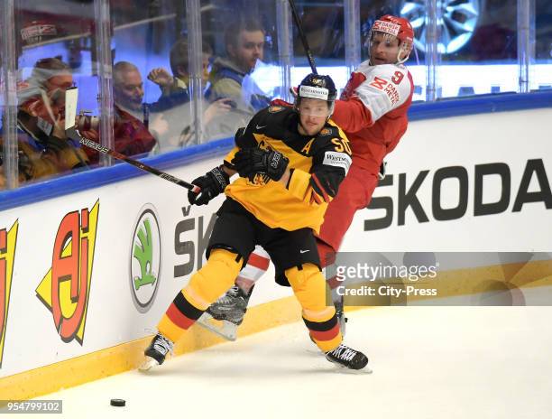 Patrick Hager of Team Germany and Frederik Storm of Team Danmark during the World Championship game between Germany and Denmark at Jyske Bank Boxen...