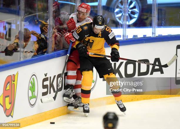 Frederik Storm of Team Danmark and Patrick Hager of Team Germany during the World Championship game between Germany and Denmark at Jyske Bank Boxen...