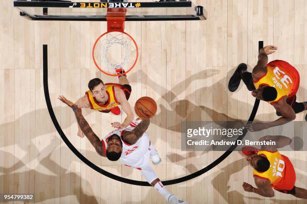 Joe Johnson of the Houston Rockets shoots the ball over David Stockton of the Utah Jazz during Game Three of the Western Conference Semifinals of the...