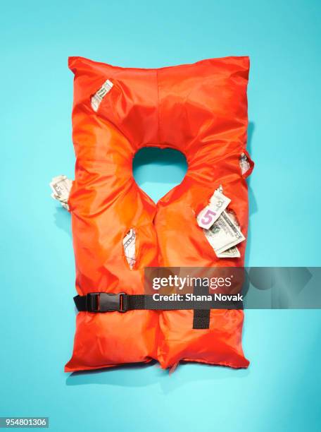 Life Vest Stuffed With Money, Stock-Foto