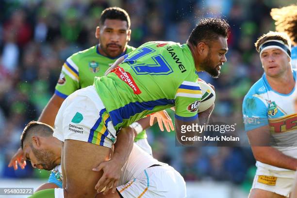 Dunamis Lui of the Raiders is tackled during the round nine NRL match between the Canberra Raiders and the Gold Coast Titans at GIO Stadium on May 5,...
