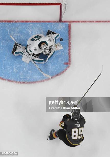 Alex Tuch of the Vegas Golden Knights scores a goal against Martin Jones of the San Jose Sharks in the third period of Game Five of the Western...