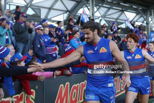 Tom Boyd of the Bulldogs celebrates after teh Bulldogs defeated the Suns during the round seven AFL match between the Western Bulldogs and the Gold...