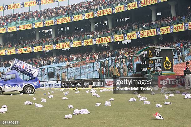 Rolled seat covers can be seen lying on the ground after the cancellation of the fifth and final One Day International cricket match at The Feroz...