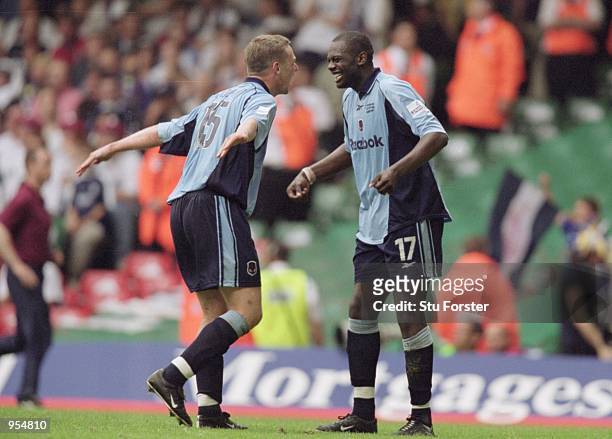 Kevin Nolan and Michael Ricketts both of Bolton celebrate during the Nationwide Division One Playoff Final between Bolton Wanderers and Preston North...